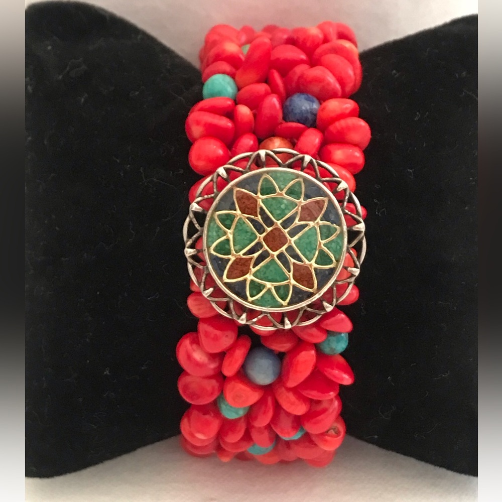 Carolyn Pollack coral stretch bracelet. Inlaid 925 charm.